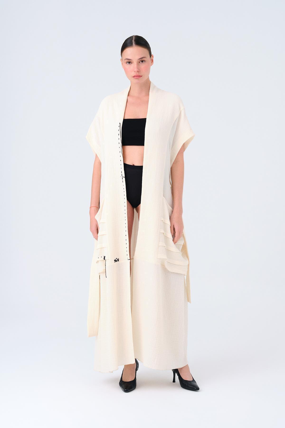 KREM SİYAH DİKİŞ DETAYLI MÜSLİN KAFTAN - MİİN