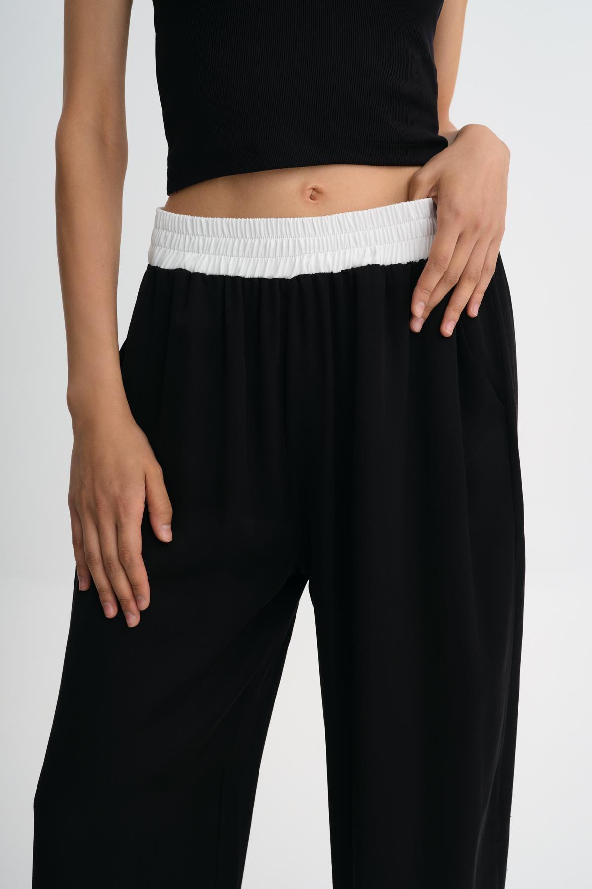 SİYAH BELİ LASTİKLİ DÖKÜMLÜ BOL PAÇA PANTOLON - MİİN