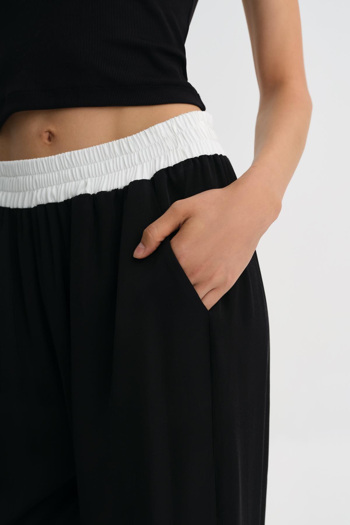 SİYAH BELİ LASTİKLİ DÖKÜMLÜ BOL PAÇA PANTOLON - MİİN