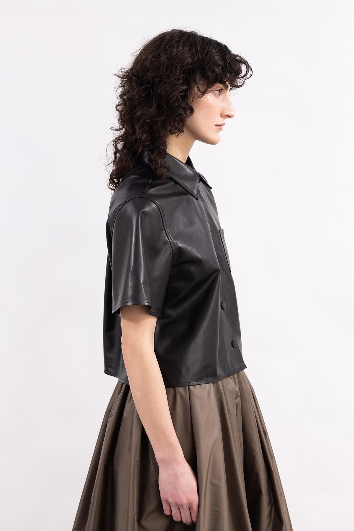 BLACK SHORT SLEEVE FRONT SNAP CLOSURE LEATHER SHIRT